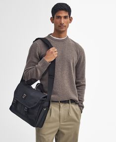 Field Waxed Satchel Whether you're looking for a reliable bag to accompany you on your commutes or a crossbody staple for hands-free wear, the Barbour Field Waxed Messenger Bag makes the perfect choice. This waxed style features an adjustable webbed shoulder strap for comfortable wear, a grab handle and inner laptop compartment to keep your essentials safe on-the-go. Classic Waxed Finish Shoulder Backpack, Classic Shoulder Bag With Waxed Finish, Casual Satchel Camera Bag With Removable Pouch, Casual Saddle Shoulder Bag, Functional Shoulder Bag With Top Carry Handle For Work, Casual Everyday Camera Bag With Adjustable Strap, Everyday Functional Satchel Camera Bag, Classic Waxed Finish Shoulder Bag For Travel, Classic Travel Shoulder Bag With Waxed Finish