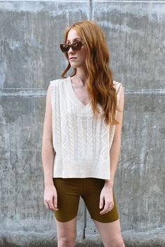 Victoria cream cable knit sweater vest. Cotton PIPE AND ROW Chic Cable Knit Sweater Vest For Fall, Cozy Cable Knit Sweater Vest For Fall, Sleeveless Cable Knit Vest For Spring, Chic Cable Knit Sweater Vest For Winter, Fall Cable Knit Sweater Vest For Layering, Spring Sleeveless Cable Knit Sweater Vest, Spring Cable Knit Sleeveless Sweater Vest, Fall Cotton Textured Knit Sweater Vest, Fall Textured Knit Cotton Sweater Vest