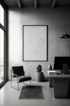 an empty room with a chair, desk and computer on the floor in front of a large window