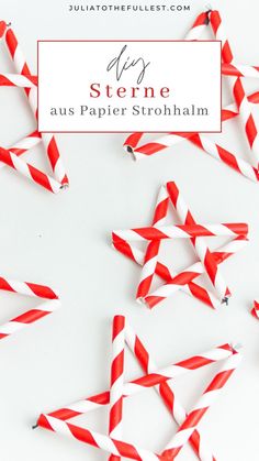 some red and white paper stars on a white background with the words my stene aus papie strohlam