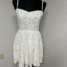 Cream/Ivory Lace Dress - Size Medium. New With Tag. Zips In The Back. Measures 25” Long From Top Of Dress To Bottom (Not Including Straps) Casual Cream Lace Mini Dress, White Lace Dress With Spaghetti Straps For Spring, Casual Off White Lace Mini Dress, Casual Off-white Lace Mini Dress, Off White Lace Dress, Ivory Lace Dress, White Lace Dress, Lace White Dress, Ivory Lace