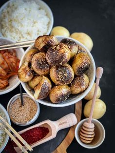 bowls filled with different types of food on top of a table