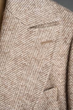 A handmade bespoke overcoat crafted from a luxurious fabric with a unique blend of fibers (wool, alpaca, mohair, silk and nylon) to give you the ultimate do-it-all coat. Wool gives it lasting performance and versatility. Alpaca gives it softness and warmth. Mohair gives it a crisp drape with natural wrinkle-resistance. Silk gives it a luster and natural sheen. And nylon gives it strength and durability to last the test of time. You will love this coat - it will elevated your entire wardrobe and Beige Wool Outerwear With Pressed Crease, Timeless Beige Outerwear With Pressed Crease, Beige Fitted Wool Coat With Concealed Placket, Fitted Beige Wool Coat With Concealed Placket, Beige Tweed Jacket With Hidden Button And Lapel Collar, Fitted Beige Outerwear With Pressed Crease, Luxury Beige Sport Coat For Fall, Beige Outerwear With Lapel Collar And Pressed Crease, Beige Wool Tweed Jacket With Lapel Collar