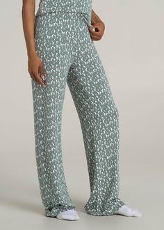 About Our Wide Leg Women's Tall Pajama Pants The perfect pair of tall women’s pajama pants is finally here. Made with a stretch-infused modal, these pants are super soft to the touch and ready for lounging, snoozing, or scrolling. We designed these just for women from 5’9 to 6’6. That means they have an extra long length, but a waistband tailored to your hips. A high rise and elasticized waist gives these a comfortable and supportive fit. These women’s tall pajama pants are finished with a wide Wide Leg Pajama Pants, Scrubs Dress, Cozy Sleepwear, Malachite Green, Womens Pajamas Pants, Summer Lookbook, Pajama Pant, Giraffe Print, Sports Blazer