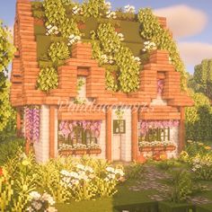 an image of a house in the middle of flowers