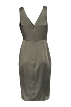 Slip into some casual satin this weekend with this simple yet sleek dress from Reiss. Featuring a surplice neckline and buttons down the side, this versatile midi dress will be your go-to piece for an effortless look. Pair with a crossbody bag and sandals or dress it up with heels. Size 8 100% Polyester Invisible zipper back Surplice style Front button detail Back zipper Bust 35" Waist 30" Shoulder to hem 42" Chic V-neck Satin Dress For Work, Chic Solid Color Sleeveless Satin Dress, V-neck Satin Dress For Work, Chic Satin V-neck Dress With Surplice Neckline, Sleeveless Silk V-neck Dress For Spring, Spring Sleeveless Silk V-neck Dress, Chic Knee-length Sleeveless Silk Dress, Sleek V-neck Midi Dress For Spring, Spring Sleeveless Satin V-neck Dress