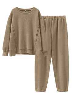 PRICES MAY VARY. Size - S=US(4-6), M=US(8-10), L=US(12-14), XL=US(16-18), see details in rich description. Features - This cozy loungewear set is crafted from fuzzy fleece fabric and includes a long-sleeve crewneck sweatshirt with side slits, a longer back hem, and jogger pants for a stylish yet comfortable look. Material - Made of 100% Polyester, this set features a soft fabric that feels like a warm hug. Perfect for lounging at home or stepping out in comfort. Occasion - The womens 2 piece set Amazon Sweatpants, Womens 2 Piece Outfits, Wardrobe Refresh, Wishlist 2024, Snow Wear, Sweatsuit Set, Winter Pajamas, Cozy Pajamas, Cozy Loungewear