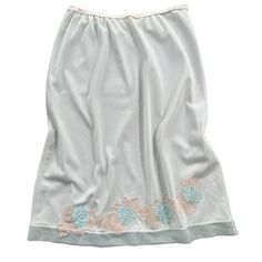 Vintage blue embroidered slip skirt. Gorgeous floral hem details. Unusual design and color. Marked size small. Measured flat ~ Waist: 12.4-15" Hips: 18" Length: 22" No returns or refunds. Please ask all questions before buying!! Light Blue Lace Trim Bottoms For Summer, Light Blue Bottoms With Lace Trim For Summer, Knee-length Floral Embroidery Skirt For Spring, Spring Loungewear Mini Skirt, Knee-length Summer Skirt With Floral Embroidery, Knee-length Floral Embroidered Skirt For Summer, Summer Knee-length Skirt With Floral Embroidery, Spring Loungewear Lined Skirt, Spring Blue Skirt With Lace Trim