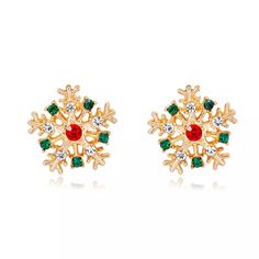 two pairs of gold tone earrings with green and red stones in the center, set against a white background