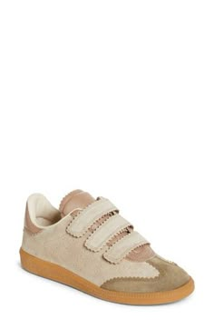 Smart pinking traces the contours of an easy-going sneaker styled with a low-top profile and dot perforations racing up the sides. Adjustable hook-and-loop straps Leather upper and lining/rubber sole Made in Portugal Women's Designer Shoes Spring Low-top Suede Sneakers, Affordable Beige Low-top Sneakers, Isabel Marant Bobby Sneakers, Isabel Marant Beth Sneakers, Isabel Marant Wedge Sneakers, Isabel Marant Style, Wedge High Tops