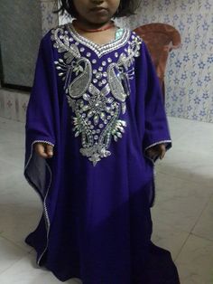 Kaftan Dress for kids, use for special event.2 years pink, 3 years pink and 4 years purple,5 years purple. Blue Sequined Kaftan For Eid, Blue Sequined Kaftan For Festive Occasions, Festive Blue Sequined Kaftan, Purple Embellished Kaftan For Festive Occasions, Hand Embellished Maxi Dress For Festivals, Festive Purple Embellished Kaftan, Purple Sequin Dress For Eid, Floor-length Dress With Handwork For Eid, Floor-length Handwork Dress For Eid