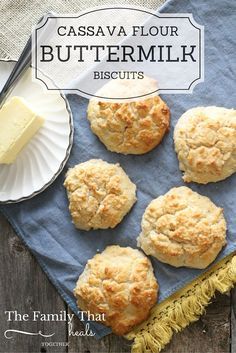 four biscuits on a blue towel with buttermilk in the background and text overlay that reads cassavaa flour buttermilk biscuits