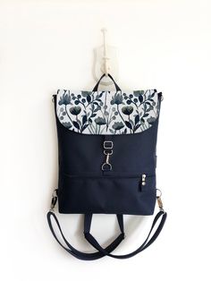 "Bohemian Convertible Backpack, Vegan Women Backpack, Waterproof Cross Body Bag, Navy Blue Shoulder Bag, Navy Functional Backpack FEATURES - waterproof outer - canvas lining - handle at the top - outer zipped pocket (frontside) - outer vertical zipped pocket (backside) - outer large open pocket - frontside - under the flap - inner zipped pocket - inner open pockets - separated backpack straps (adjustable and detachable) OPTIONAL - inner large laptop pocket MATERIALS -> waterproof fabric - CORDUR Outdoor Backpack With Detachable Strap, Navy Outdoor Backpack Bag, Navy Backpack With Zipper For Everyday Use, Navy Backpack With Zipper Closure For Everyday Use, Navy Rectangular Backpack For Daily Use, Blue Backpack With Detachable Strap, Navy Backpack With Zipper Closure, Navy Backpack With Adjustable Strap For Everyday Use, Small Hand Bags