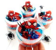 spider - man candy jars are filled with sprinkles