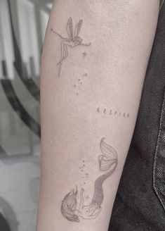 Fairy Sparkles Mermaid Tattoo Mermaid Sitting On Moon Tattoo, Twin Mermaid Tattoo, Mermaid Memorial Tattoo, Fairy And Mermaid Matching Tattoo, Simplistic Mermaid Tattoo, Sister Mermaid Tattoos, Curvy Mermaid Tattoo, Mini Mermaid Tattoo