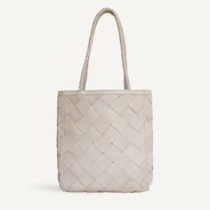 Our #1 bestselling tote in Grande Weave, wide woven leather in a textural crisscross pattern. Roomy enough to fit your laptop and beach read — it’s designed to go with you everywhere. With braided top handles for shoulder comfort. Wear it year-round, dressed up or down, it’s a modern classic. Street Style Shop, Beauty Products Gifts, Beach Read, Pearl Shop, Top Design Fashion, Comfort Wear, Luxe Gifts, Small Accessories, Accessories Branding