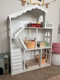 White Little Girls' Doll house with Organization Dollhouse Bookshelf, Girls Dollhouse, Chalkboard Wall, Boho Kitchen, Playroom Ideas, Kitchen Paint, Kids Playroom, Bonus Room