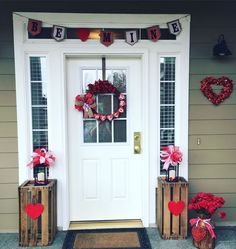 the front door is decorated for valentine's day