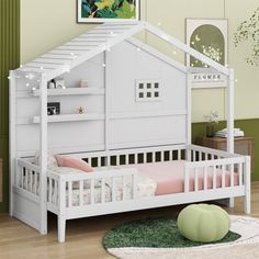 a child's bedroom with a white bunk bed and green rugs on the floor