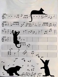 a t - shirt with cats and music notes on it