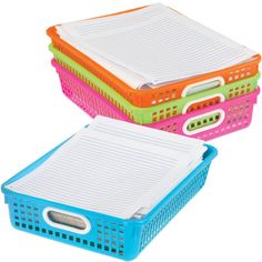 three plastic storage baskets with dividers on each side and two different colored lids, one is