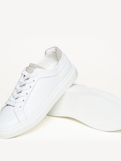 Modern, minimal design meets all-day comfort. Our signature clean leather sneaker is updated from its bestselling namesake with ultra-soft, flexible leather, and a shockingly lightweight rubber sole. Modern Custom Lace-up Sneakers With Textured Sole, Modern High-top Sneakers For Light Sports, Modern Low-top Walking Shoes, Modern Custom Sneakers With Textured Sole, Modern Low-top Sneakers With Leather Sole, Modern High-top Walking Shoes With Rubber Sole, Modern Lace-up Custom Sneakers For Light Sports, White Low-top Walking Shoes With Stitched Sole, Modern Sneakers With Rubber Sole For Light Sports