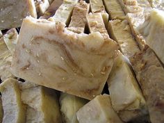 sliced bananas sitting on top of each other in a pile next to another piece of bread