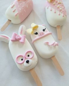 four marshmallow pops decorated to look like animals