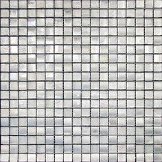 a close up view of a glass tile wall