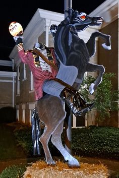 a statue of a man riding on the back of a horse