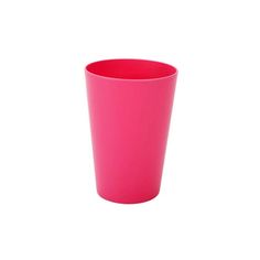 a pink cup sitting on top of a white table