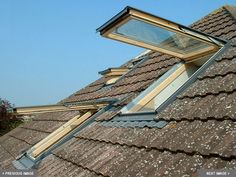 an image of a roof that has some windows on it