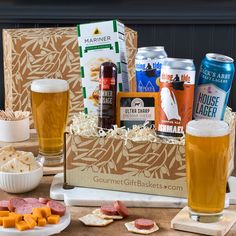 beer and snacks are sitting on a table