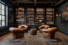 a living room with two leather chairs in front of a wall full of liquor bottles