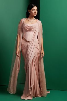 Buy Pink Crepe Quilted Bead Cape Open Embellished Pre-draped Saree Set For Women by K&A By Karishma and Ashita Online at Aza Fashions. Western Gowns, Beaded Cape, Indo Western Gown, Draped Saree, Drape Saree, Beaded Neckline, Cape Sleeves, Bridal Couture, Set For Women