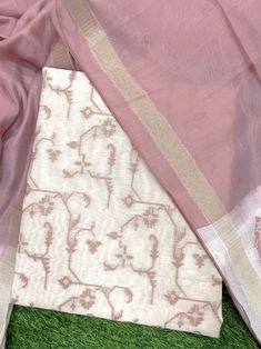 Product Details Flamingo Pink Unstitched Jamdani Linen Suit Set Elevated with Jari and Thread Woven Work Product contains Unstitched Kurta and Bottom with a Surreal Soft Dupatta Comes with the Vishnu Weaves Promise of Premium Quality Size & Fit Kurta : 3.2 Mtrs Bottom : 2.50 Mtrs Dupatta : 2.30 Mtrs Material & Care Top Fabric is made from linen and Dupatta is of Pure Viscose material. Bottom Fabric is Viscose Santoon. 100% breathable Fabric. Machine Wash Recommended. White Embroidered Fabric With Self Design, Formal Beige Unstitched Suit, Elegant Designer Handloom Sets, Elegant Handloom Sets For Eid, Eid Elegant Handloom Sets, Designer Unstitched Raw Silk Suit In White, Unstitched Elegant Cotton Silk Embroidered Fabric, Designer White Sets With Cutdana, Elegant Unstitched Embroidered Cotton Silk Fabric