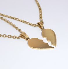 Celebrate the unique connection you share with your special someone with this set of two interlocking broken heart pieces. Perfect for Valentine's Day or any special occasion, these delicate necklaces are a symbol of the unbreakable bond you share.  ITEM DETAILS Colour: Gold (also available in Silver) Material: 304 Stainless Steel Measurement: 16-22 inches (custom) Quantity: 2  *All necklaces are made to order with extendable chain [approx 40x3mm]. Custom necklace lengths are available (max 22 inches), include this in item personalisation. ENVIRONMENT All packaging is made with recyclable and biodegradable materials.  SHIPPING Free 2nd class delivery in the United Kingdom (UK). Orders are dispatched within one working day.  RETURNS POLICY Returns and exchanges accepted within 14 days of de Gift Ideas Girlfriend, Valentines Gift Ideas, Custom Chain, Delicate Necklaces, Couple Jewelry, Jewellery Set, Girlfriend Boyfriend, Valentines Gift, Custom Necklace