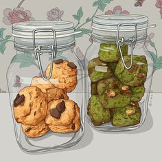 two glass jars filled with cookies next to each other