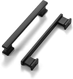 two black cabinet handles on white background