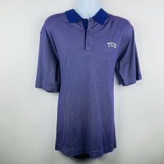 a purple polo shirt that says tcu on the front and blue trim around the collar