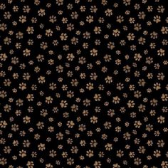 a black background with brown and white dog paw prints