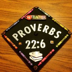 a black graduation cap with the words provers 22 6 written on it