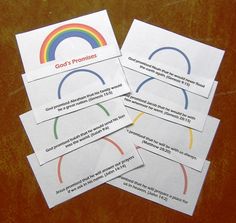 four business cards with the words god's prementies written in rainbow colors