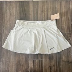 Nike Tennis Standard Fit Skirt Gray Ish Blue Size Xl Please Check Pictures For Any Measurements The Color Has A Hint Of Blue But Also Gray Casual Nike Fitted Tennis Skirt, Spring Swim Skirt With Pockets, Nike Fitted Casual Skirt, Nike Casual Short Skirt, Casual Short Nike Skirt, Casual Fitted Nike Skirt, Nike Pleated Tennis Skirt For Spring, Nike Spring Pleated Skirt, Nike Mini Skort