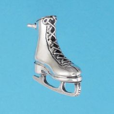 an ice skate ornament on a blue background