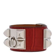 This is an authentic HERMES Matte Alligator Collier De Chien CDC Bracelet in Rouge H. This stylish cuff is crafted of fine matte alligator leather in red. The bracelet features large palladium studs with a loop charm set in between. Luxury Leather Cuff Bracelets, Luxury Leather Cuff Bracelet, Designer Leather Bracelet, Luxury Leather Cuff Jewelry, Luxury Red Leather Jewelry, Luxury Red Leather Bracelets, Luxury Red Leather Bracelet, Luxury Leather Bracelet With Palladium Hardware For Formal Occasions, Elegant Red Leather Bracelets