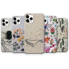 four iphone cases with different designs on them, one in white and the other in beige