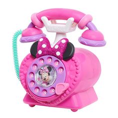 a pink mickey mouse telephone with minnie mouse on it