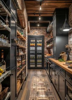 a narrow kitchen with brick walls and wooden flooring, along with lots of shelves