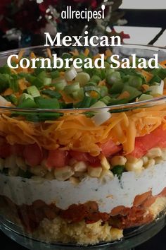 mexican cornbread salad in a glass bowl with text overlay that reads, allrecipes mexican cornbread salad